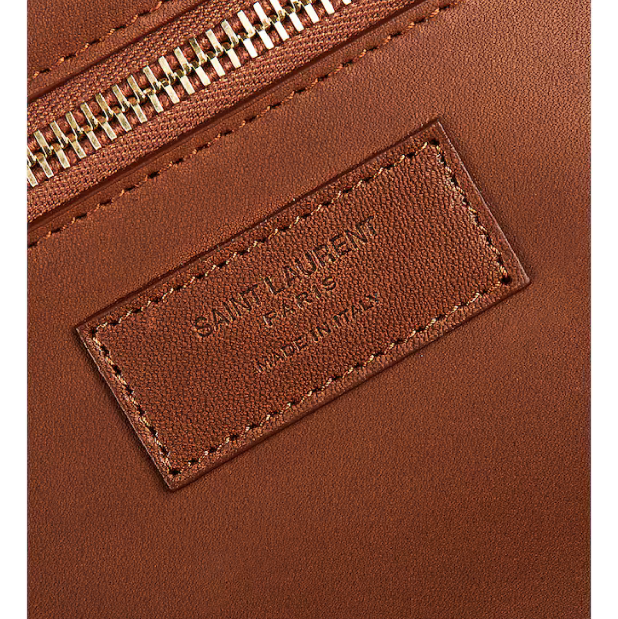 Brown leather pouch with a visible brand label on a white background