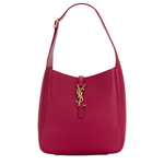 Red handbag with a gold logo on a white background