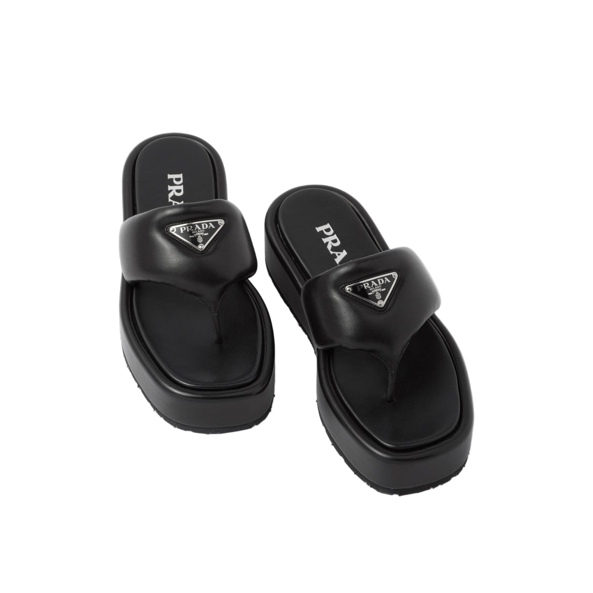 Pair of black Prada sandals on a light gray background