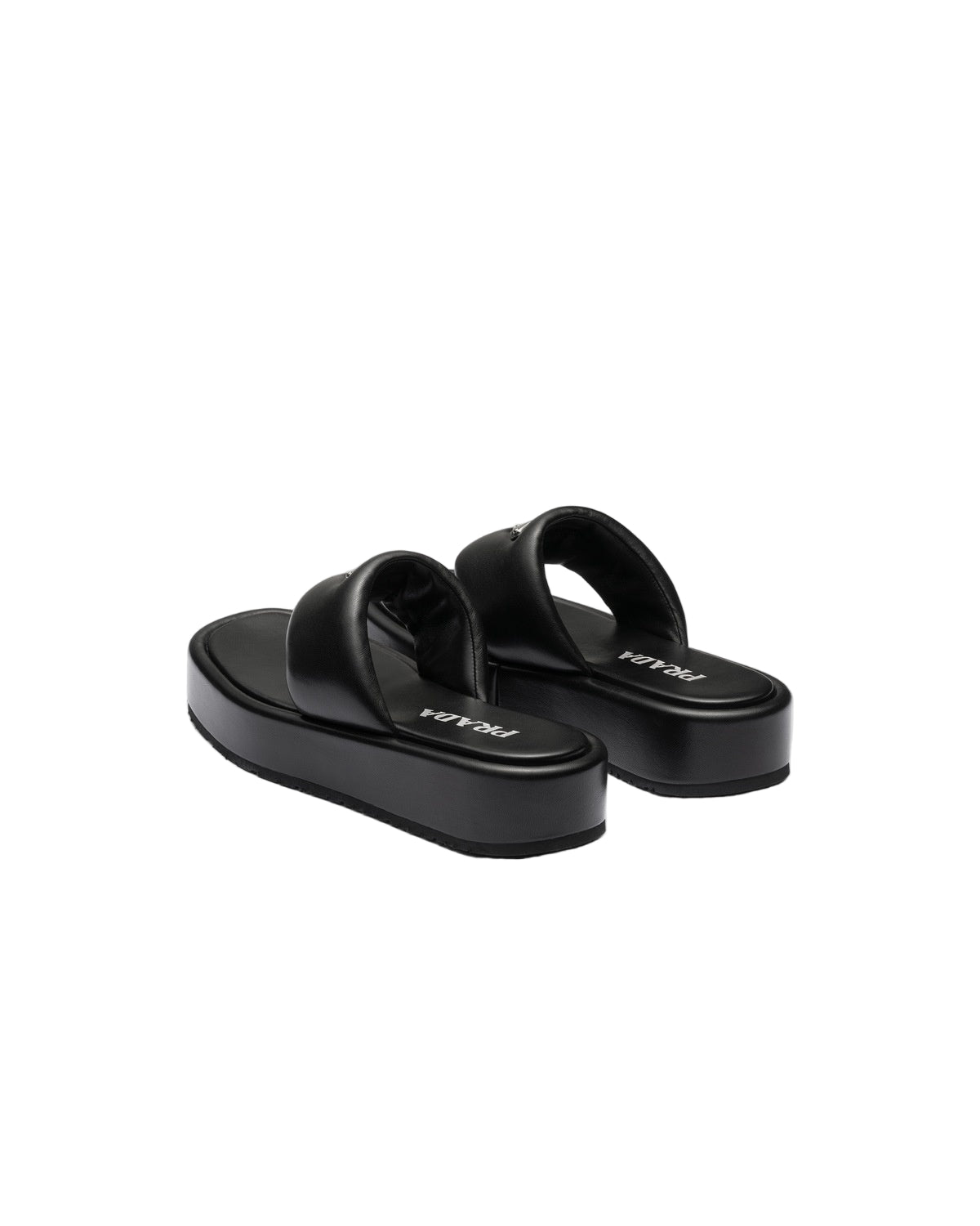 Black sandals with a brand logo on a light gray background