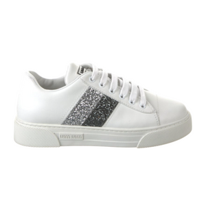 White sneaker with glitter accents on a white background