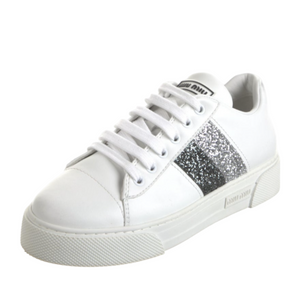 White sneaker with glitter accents on a white background