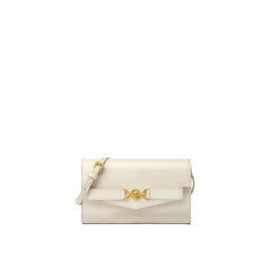 White handbag with gold clasp on a white background