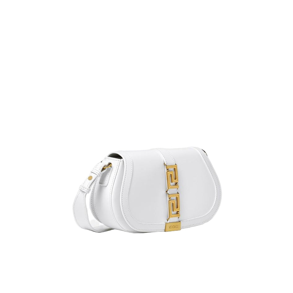 White handbag with gold accents on a white background