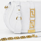 White handbag with gold accents and Versace logo on a white background