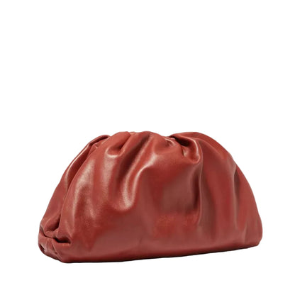 Red leather clutch bag on a white background