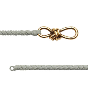 Gray braided leather strap with a gold knot on a white background