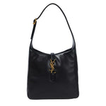 Black handbag with a gold logo on a white background