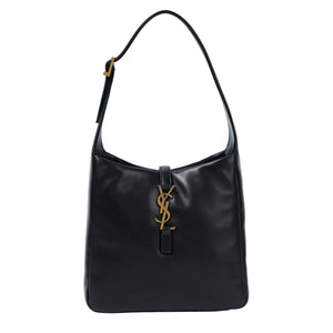 Black handbag with a gold logo on a white background