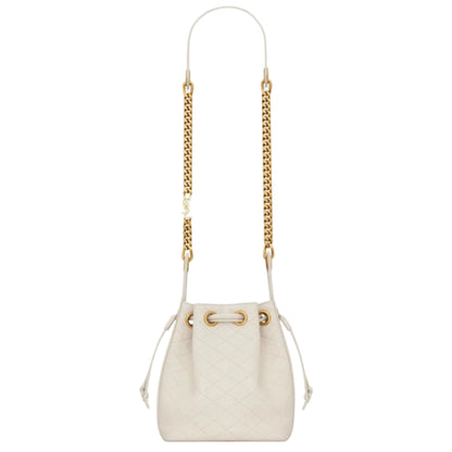 White handbag with gold chain strap on a white background