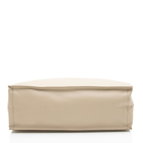Beige rectangular pouch on a white background