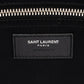 Saint Laurent Paris logo on a black textured background