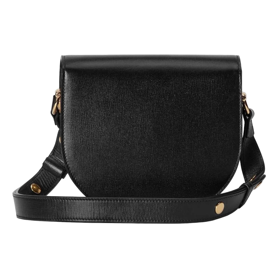 Black crossbody bag on a light gray background