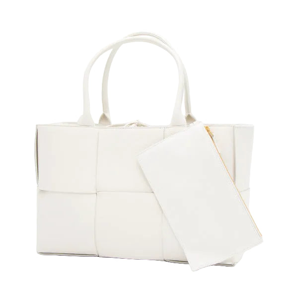 White quilted tote bag with a matching pouch on a white background