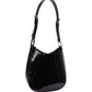 Black sequin handbag on a light gray background