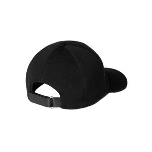 Black cap on a light gray background