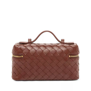 Brown woven handbag with gold zipper on a white background
