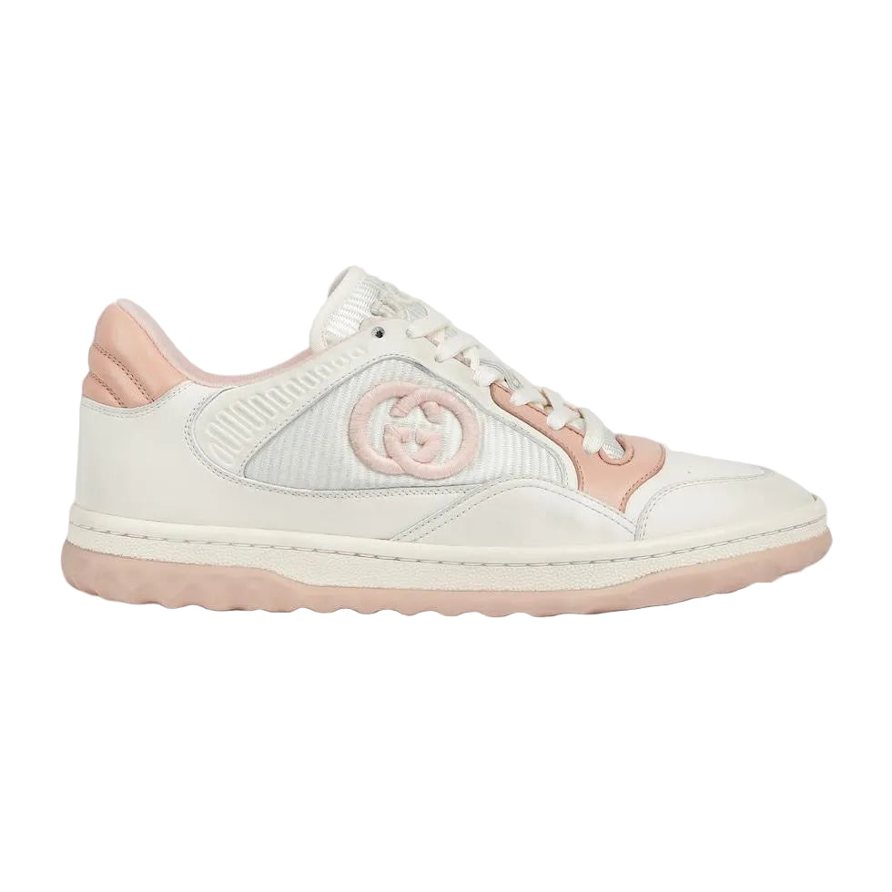 White and pink sneaker with Gucci logo on a light gray background
