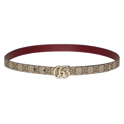 Designer belt with brand logo on a light gray background