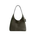 Dark green handbag on a light gray background