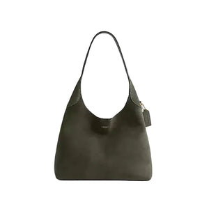 Dark green handbag on a light gray background