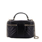 Black quilted handbag with chain detail on a white background