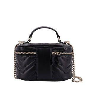 Black quilted handbag with chain detail on a white background