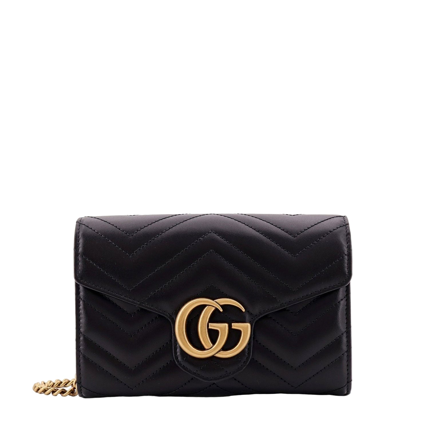 Black quilted handbag with gold chain and logo on a white background