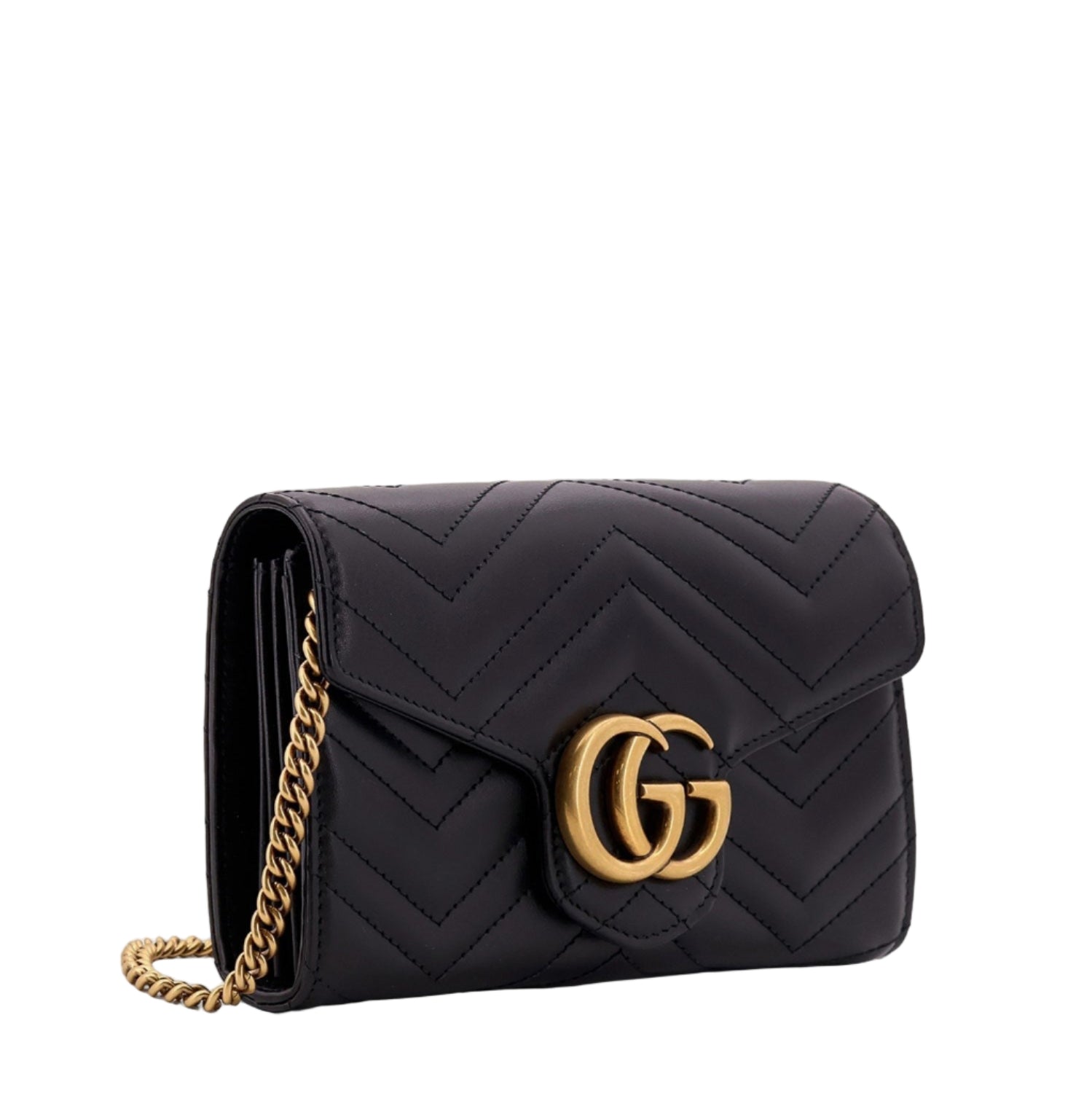 Black quilted handbag with gold chain and logo on a white background