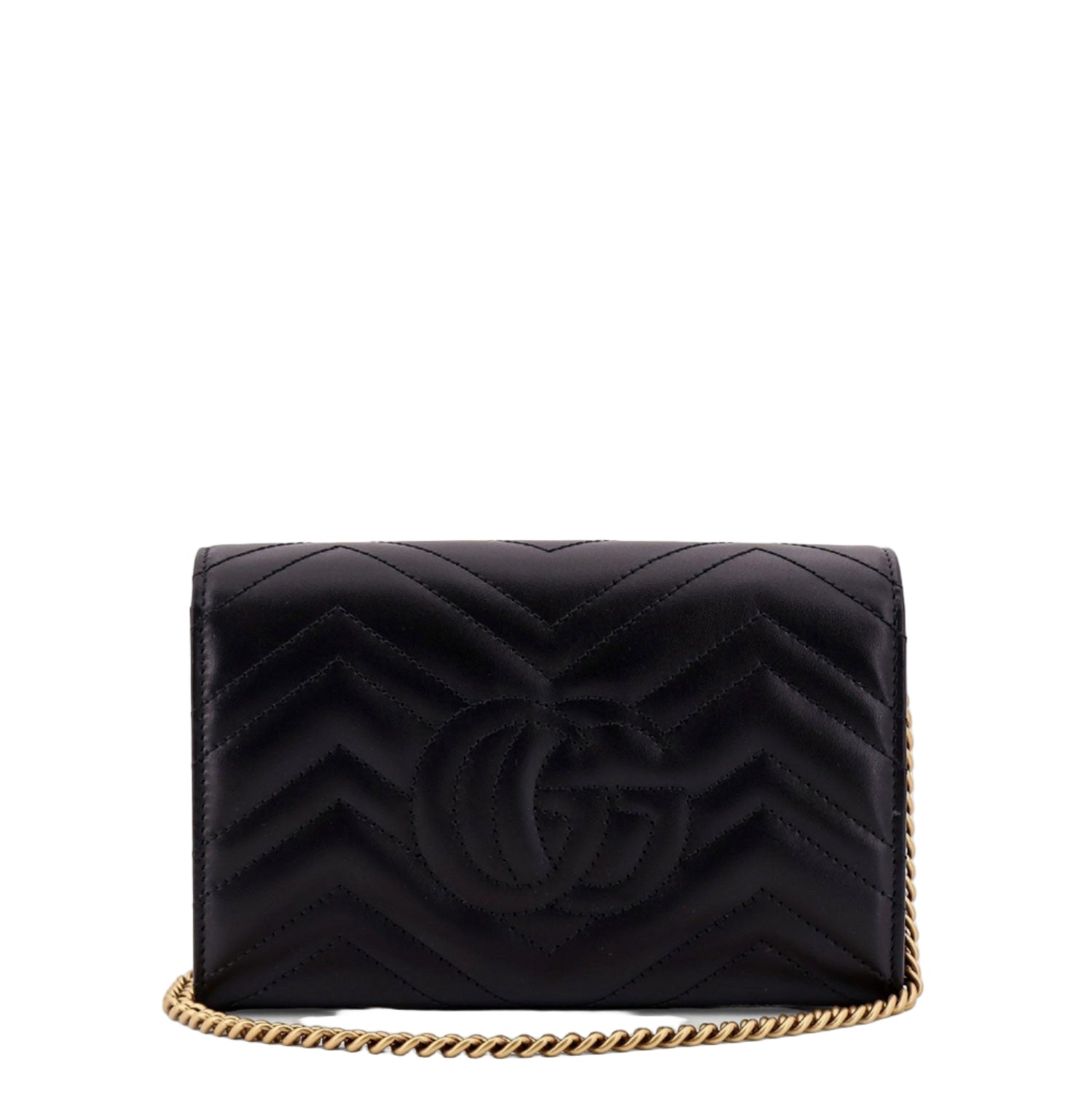Black quilted handbag with gold chain on a white background