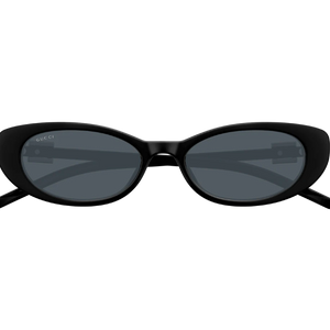 Black sunglasses with dark lenses on a white background