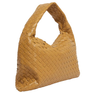 Brown woven handbag on a white background