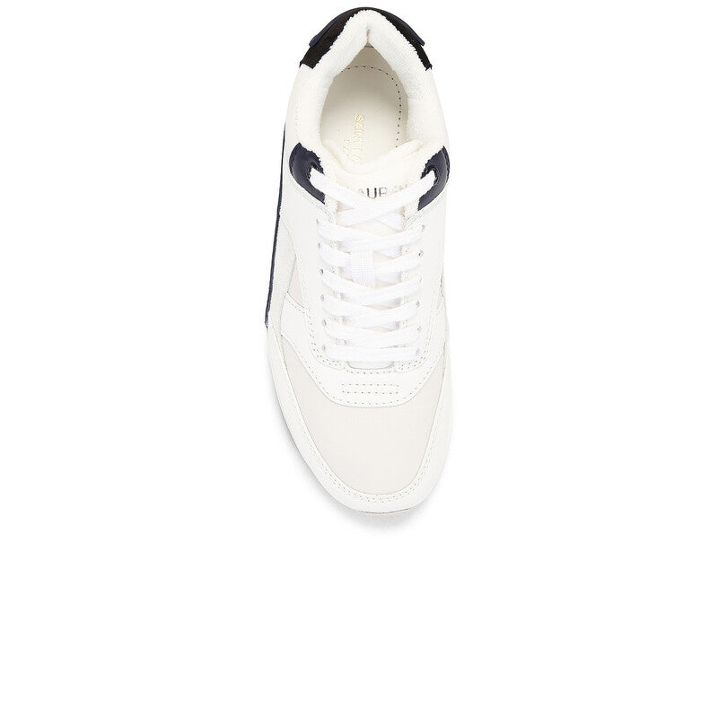 White sneaker with black accents on a white background