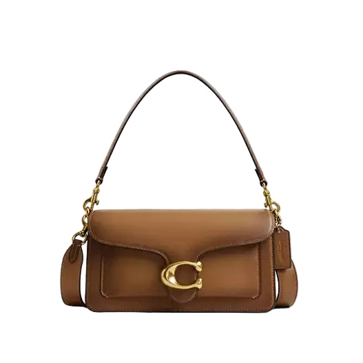 Brown handbag with gold clasp on a light gray background