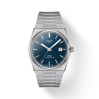 Silver Tissot watch with blue dial on a white background